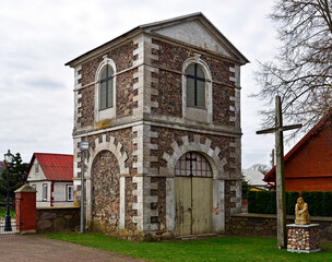 Close-up photos of the architectural details and the belfry of the Catholic Church of Saint Lawrence built at the beginning of the 19th century in Dolistowo in Podlasie, Poland.