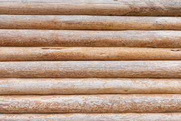 Texture, structure or pattern of old wood or timber surface of house, hut or cottage of beams, logs, trunks or planks laying horizontally