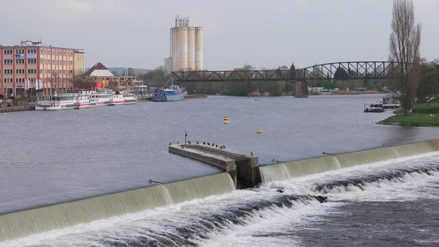 A beautiful shot of flowing water of Weser River in Hameln, Germany in HD