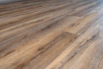 Background made of modern vinyl panels imitating wood in a living room with selective focus.