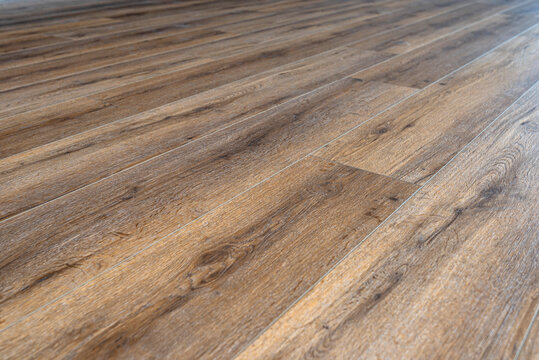 Background Made Of Modern Vinyl Panels Imitating Wood In A Living Room With Selective Focus.