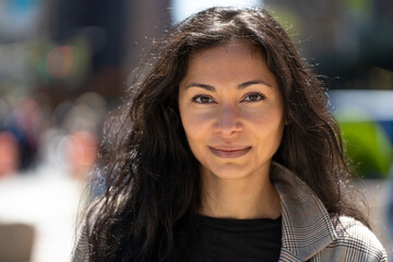 Woman in city serious face portrait