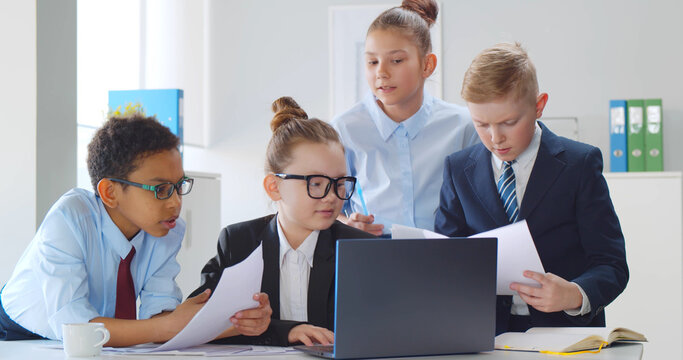 Young Diverse Businessmen At Board Meeting In Office.