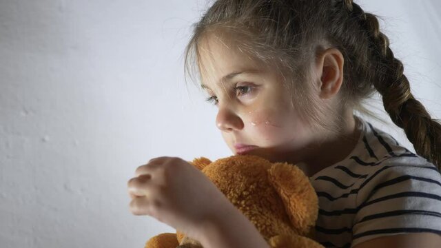 Girl is cry in corner. Violence against children in family. Family violence. Cry kid. Family violence concept. Girl is cry with fear. Child abuse. Sad family. Fear of child in dark. Kid cry in corner
