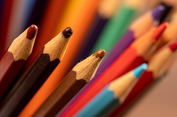 Obraz premium Colorful pencils in a glass. Self-isolation in the covid-19 pandemic.