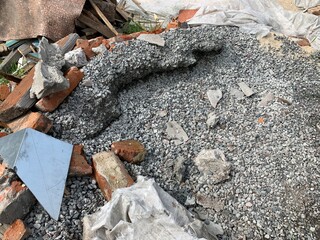 Construction crushed stone on the ground. Construction waste.
