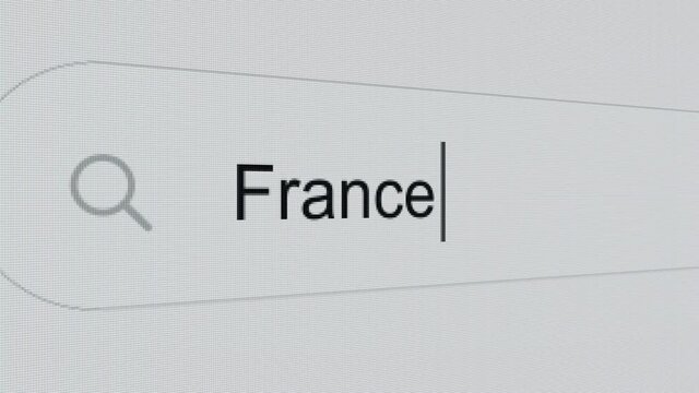 France - Pc screen internet browser search engine bar typing european Country name.