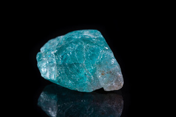 Macro mineral stone apatite on black background