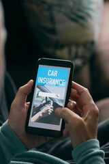 man searches a car insurance on his smartphone