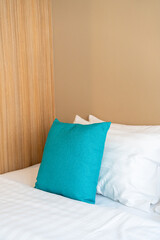 Fototapeta na wymiar comfortable pillows on bed in bedroom