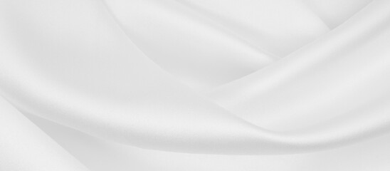 Smooth elegant white silk or satin luxury cloth texture as wedding background. Luxurious background design