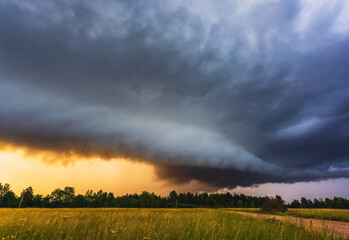 Obraz na płótnie Canvas Storm Clouds in sunset light, dramatic storm clouds