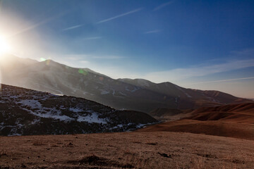 Screensaver for the background in the mountainous area, mountains in spring time