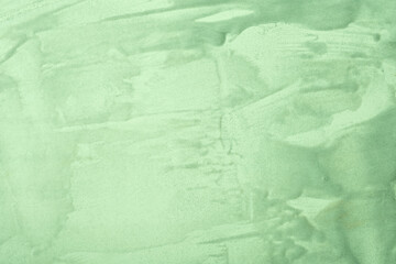 Abstract art background light green and olive colors. Watercolor painting on canvas with cyan strokes and splash