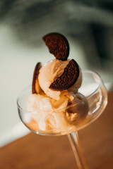 balls of ice cream in a beautiful glass dish