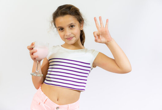 Smiling Little Kid Hold Smoothie Bottle Isolated Over White Background. Healthy Concept.