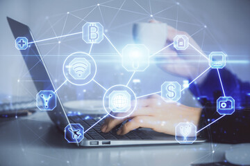 Double exposure of woman hands typing on computer and social network theme hologram drawing. People media concept.