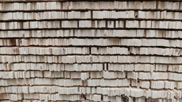 Carpentry factory. Production line of parquet board. Modern industrial factory for laminated flooring.