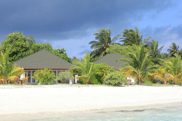 villa on a palm tropical island, Maldives