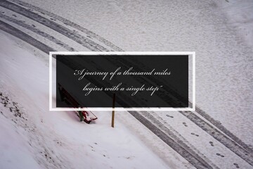 Inspirational quotes: "A journey of a thousand miles begins with a single step" typography with nature background