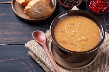 Delicious dish of Brazilian cuisine called Caldo de Feijão. Made with beans, bacon and chicken.