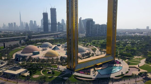 Dubai Frame building with Zabeel park and Dubai skyline aerial view