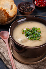 Delicious dish of Brazilian cuisine called Caldo de Mandioca. Made with cassava and meat