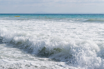 
Sea with white waves.Mediterranean, Greece. Vacation and travel in summer time. 