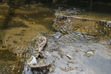 Drainage Canal Polluted with Dumped Trash