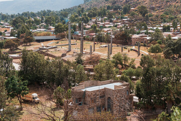 Aksumite civilization ruins, Ancient monolith stone obelisks behind Church of Our Lady of Zion,...