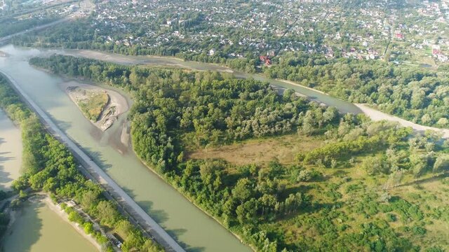 Flight over the river near the settlemen