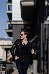 Fashion portrait of attractive woman in jeans