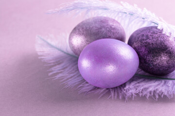 Silver lilac
Easter eggs on a lilac background. Minimal concept.