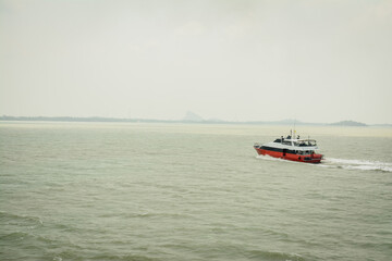 Naklejka premium A boat floating in the sea.