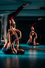 Woman and a man gymnastics exercise