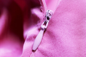 Pink zipper on the dress so close © sabdiz