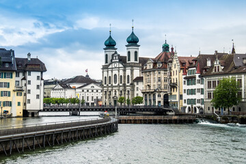 Landscape view of the old town of Luzern, with the Reuss river in the center