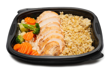 Ready food in a container. Stewed chicken, stewed carrot, cabbage and porridge.