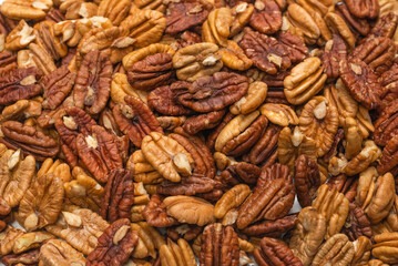 Tasty pecan-nut background. Top view.