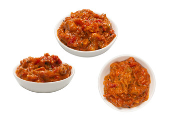 Vegetable stew in a bowl isolated on white background.