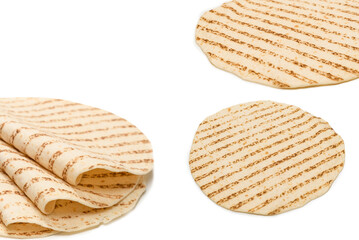 Grilled pitta bread isolated on white background.