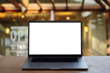 laptop on the wood table.