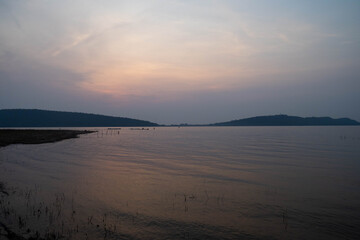landscape view with lake,blue sky,sun set