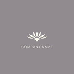A symbol or logo of a simple, minimalistic, stylized flower shape, consisting of several elements. Made with a spot.