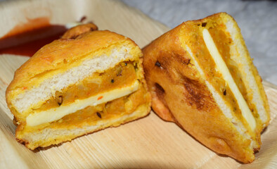 Indian or Pakistani Bread pakoda with stuffed potato curry and Paneer slice or Cottage cheese