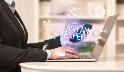 Side view of a business person working on laptop