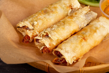 rice paper roulettes with shrimp, vegetables and greens, fried in butter