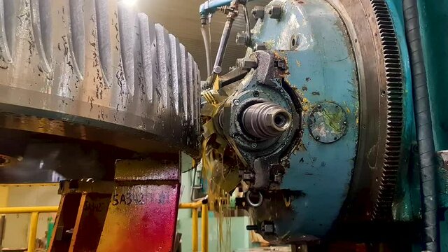Mechanical processing of gears with milling cutters on a cnc gear cutting machine. Production and manufacture of gears.