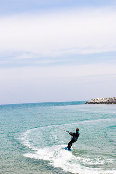 Young man kite boarding, Florida, Islamorada ( Vertical )