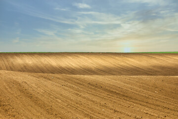 Fototapeta na wymiar plowed field landscape agriculture spring season